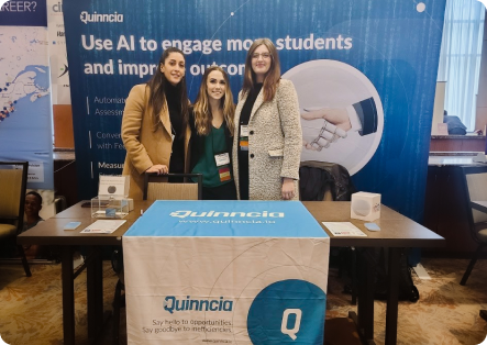 Quinncia team at a conference